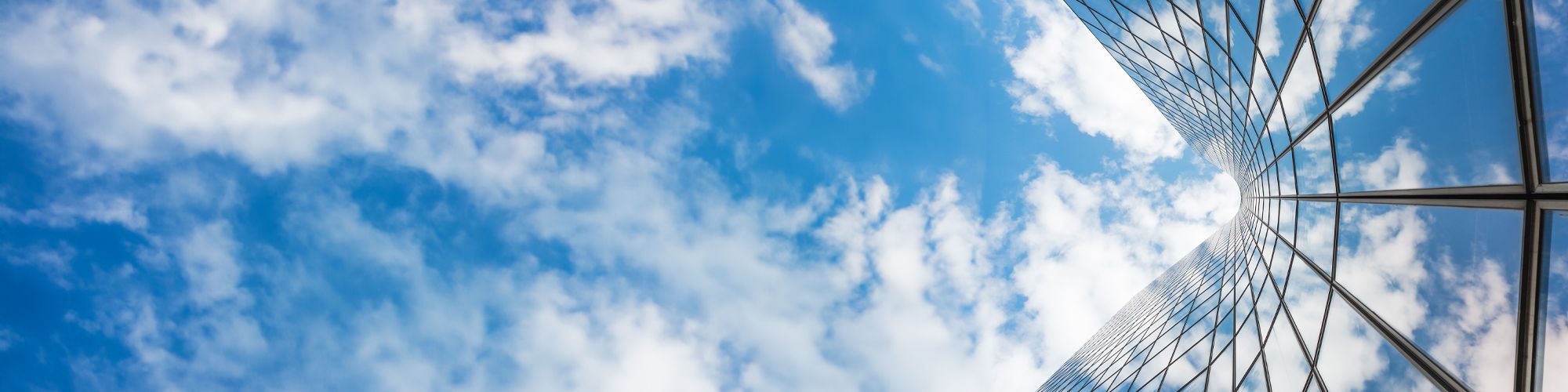 View of sky from glass infrastructure