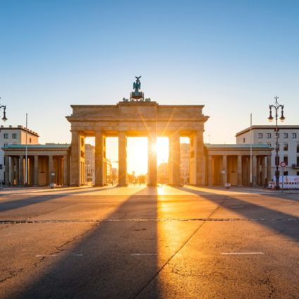 Sunrise behind Brandenburg Gate in Berlin