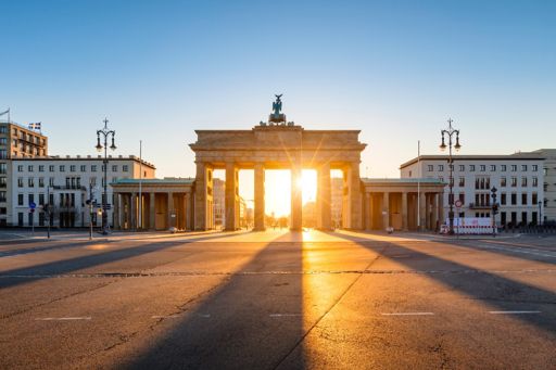 Sunrise behind Brandenburg Gate in Berlin