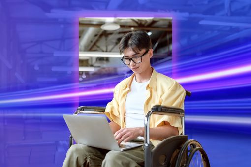 specially abled man working on laptop