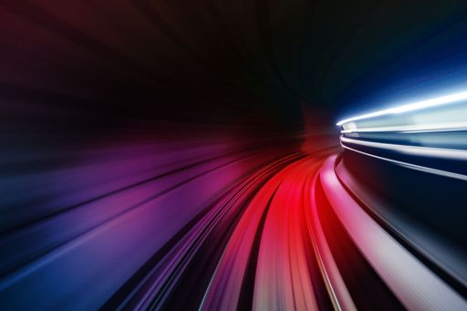 Speed light trails in an illuminated tunnel