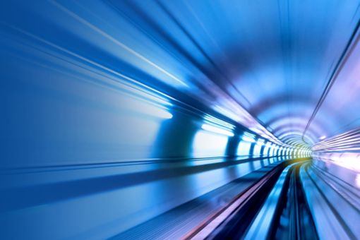 Look Back Face Forward: 2020 Real Estate trends - subway-tunnel-with-blue-and-white-lights-on-both-sides