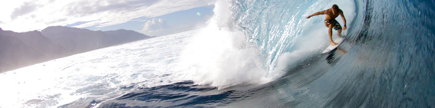 Surfer over sea waves