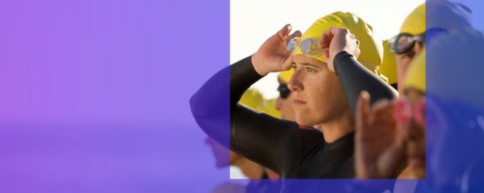 swimmer with yellow cap and diving goggles