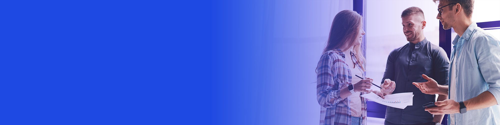 three colleagues discussing work banner