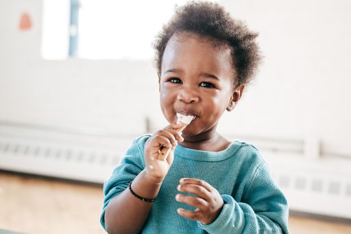 Kid having yogurt
