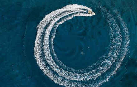 top view of boat travelling in circles
