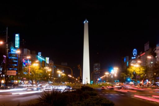 traffic in motion around the Obelisk at night