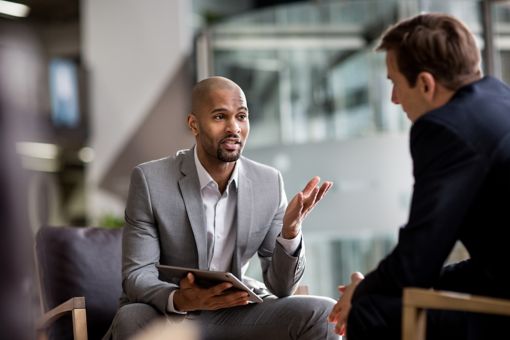 Two men talking