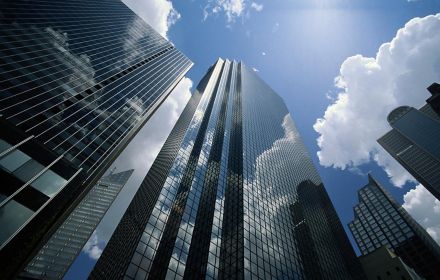office-buildings-reflecting-clouds-low-angle-view