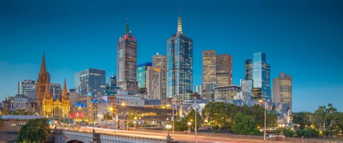View from Yarra River of Melbourne city skyline at dusk