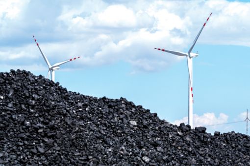 view on the pile of carbon and windmill
