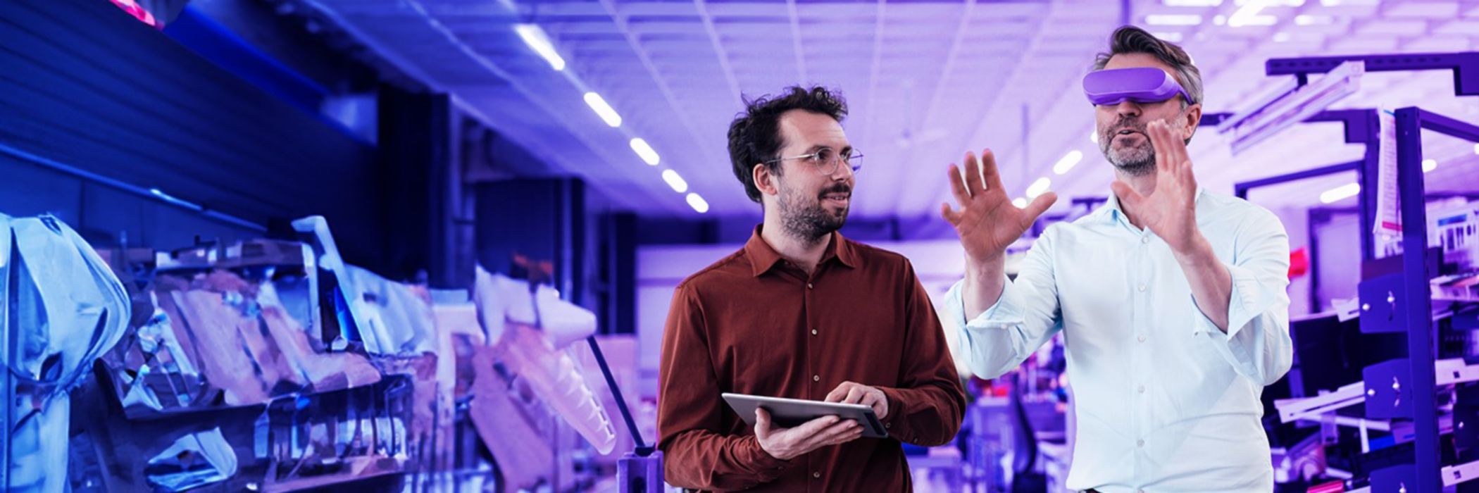 two men using vr glasses