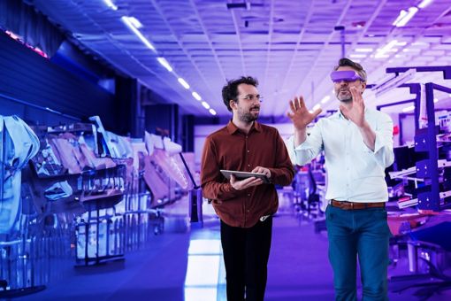 two men using vr glasses