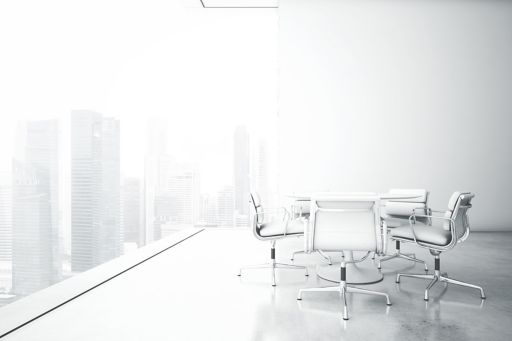 white meeting chairs around table as a symbol for KPMGs HAM2 services