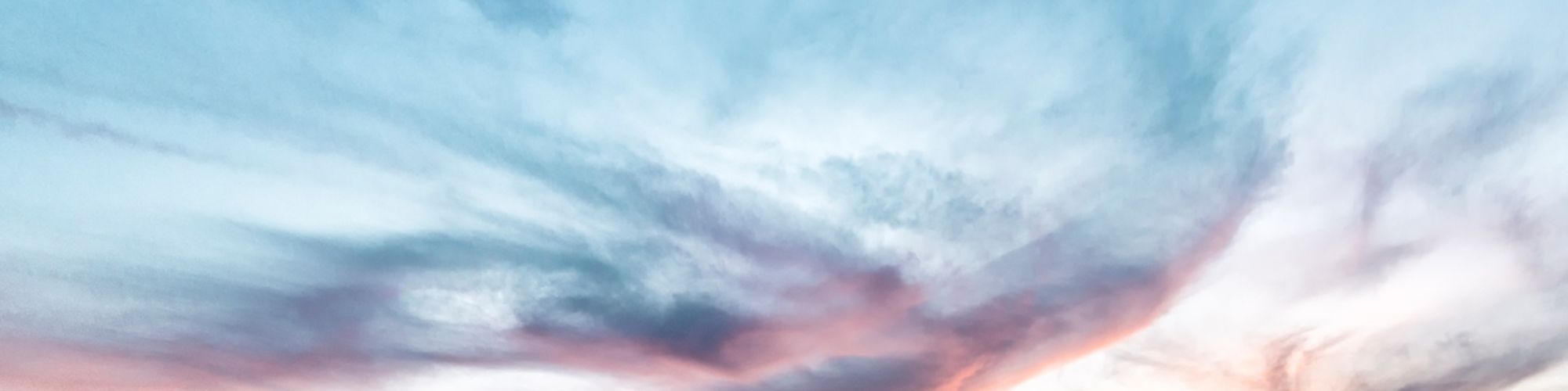 Wide angle evening sky view with city buildings