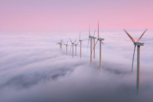 Wind turbines above clouds