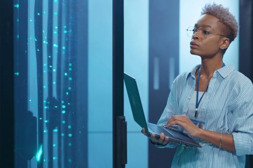 Woman carrying laptop