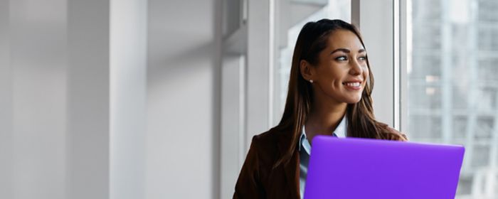 Woman holding a laptop