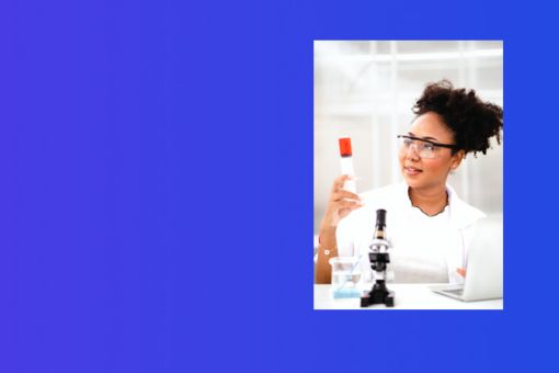 Woman holding chemicals with microscope and laptop