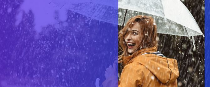happy woman holding umbrella