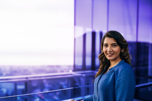 woman in blue shirt