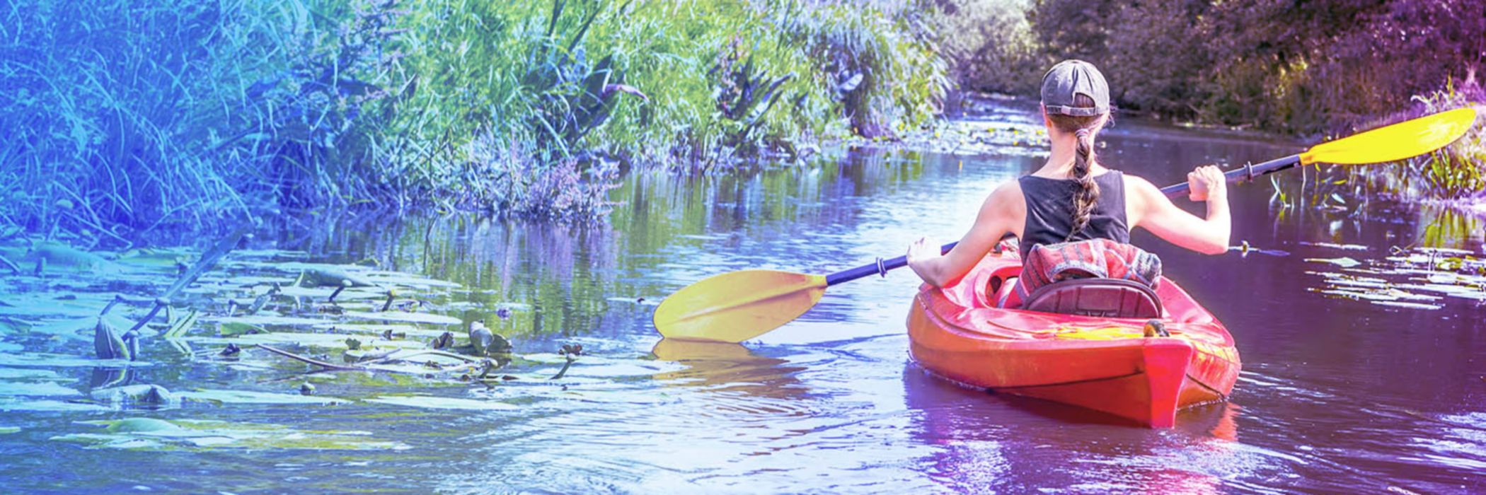 Woman paddling in a kayak