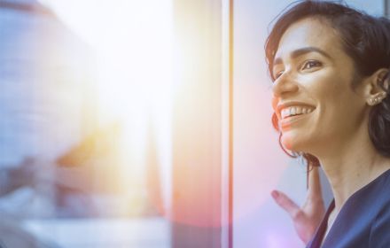 Woman Looking out of the Window in Wonder