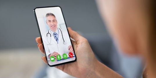 woman smartphone doctor market