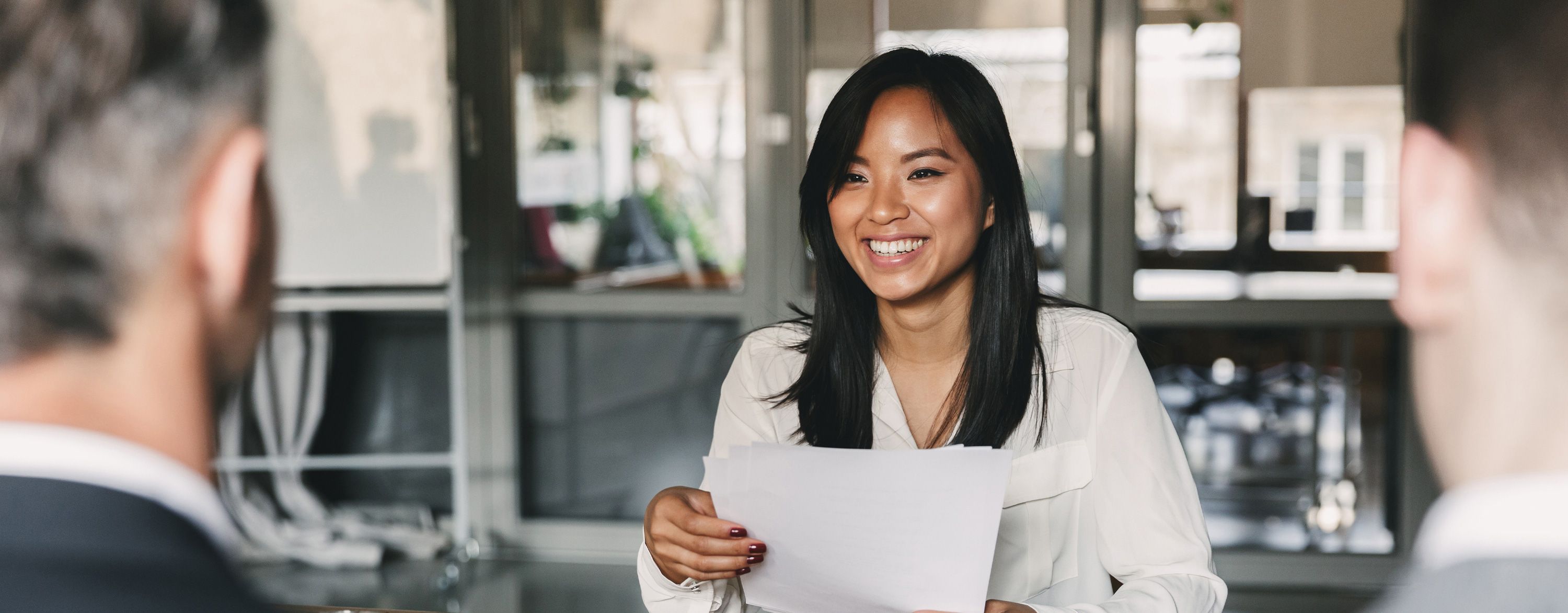 Interview professionals business woman holding paper