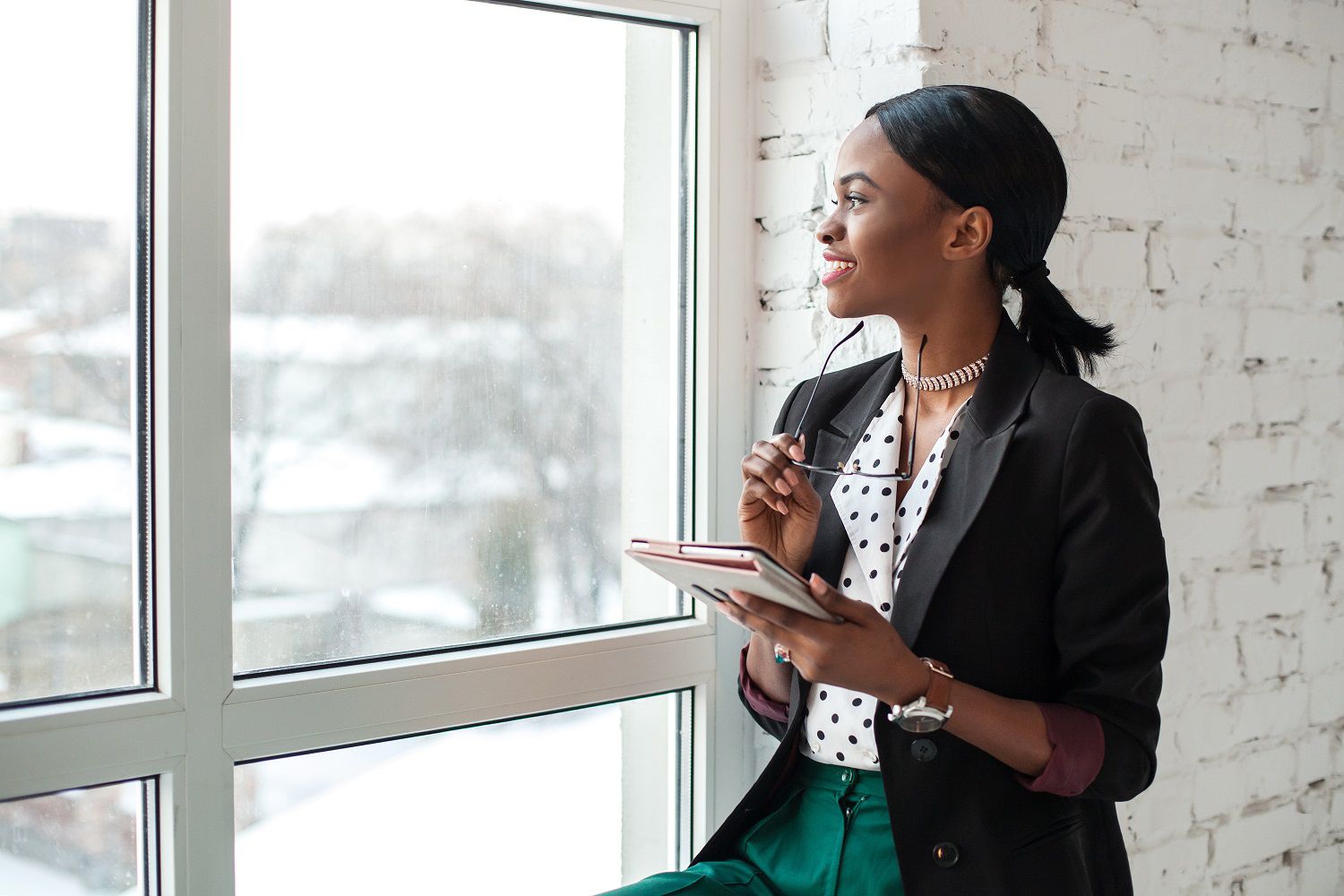 Woman smiling looking out the window