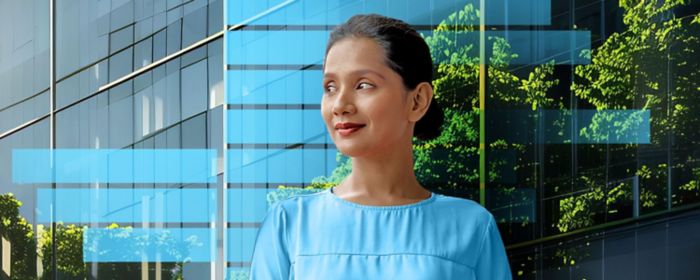 Woman standing in front of an office building