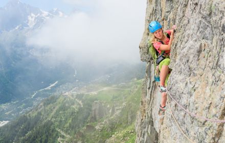 Female climber climbing in Chamonix, Mont Blanc