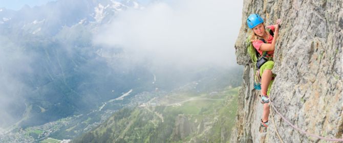 Female climber climbing in Chamonix, Mont Blanc