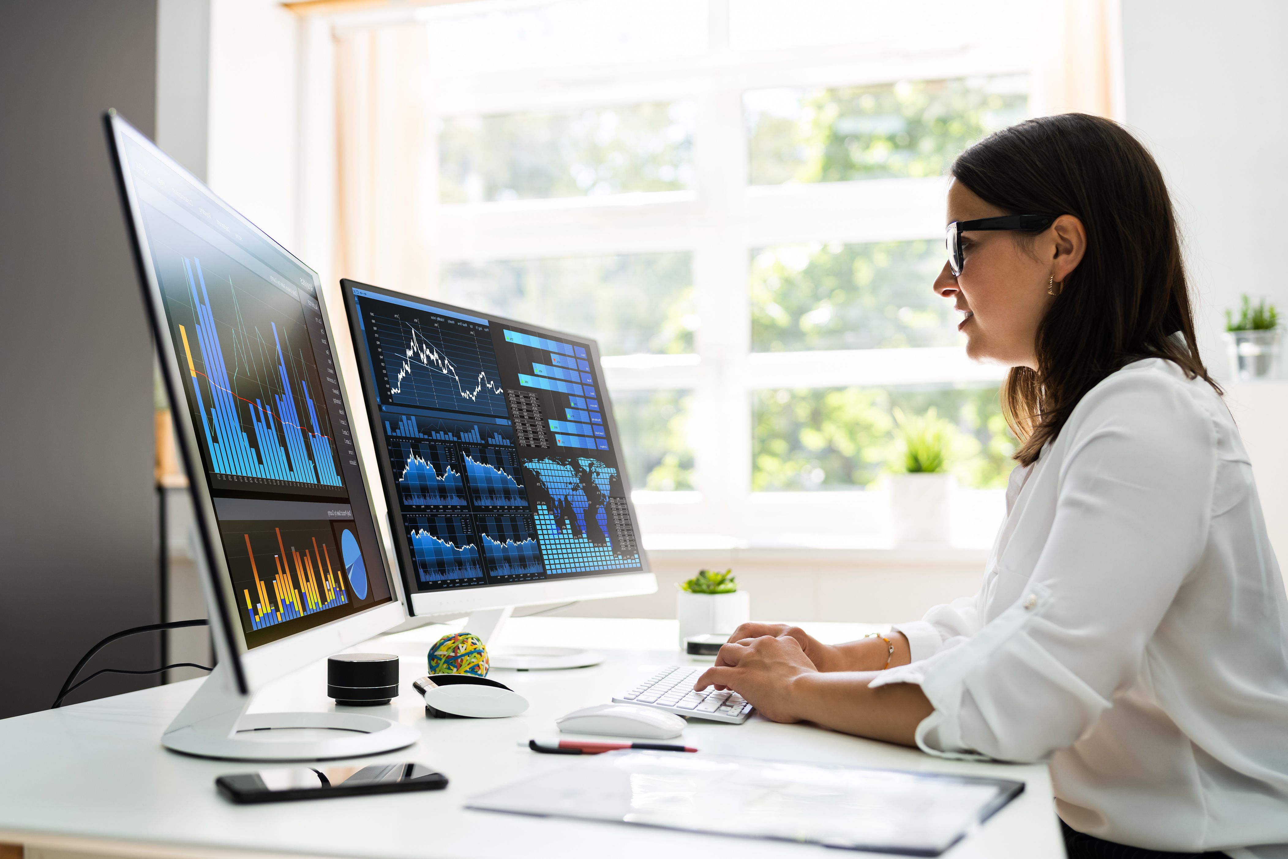 Woman working on digital charts