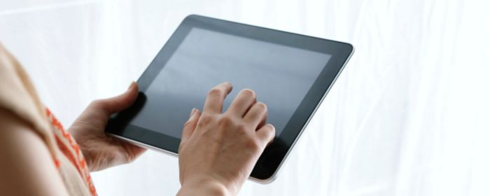 Person holding tablet