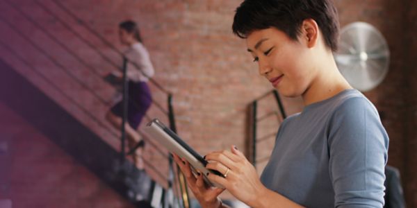 woman working on tablet