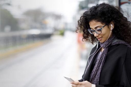 woman listing to phone