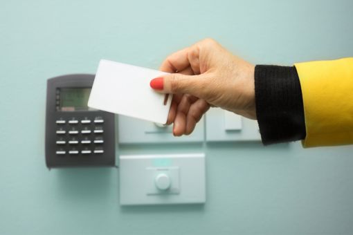 Women using card for access