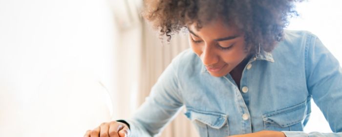 Woman using screw driver