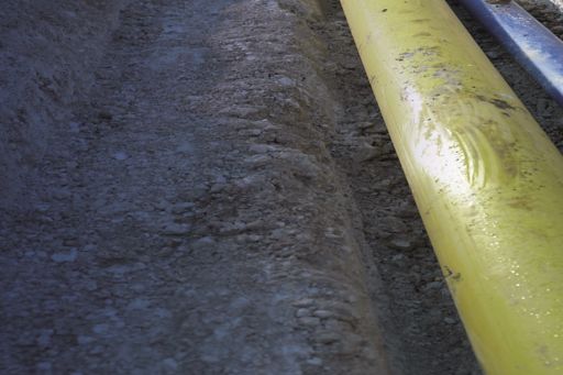 Yellow pipe in the ground