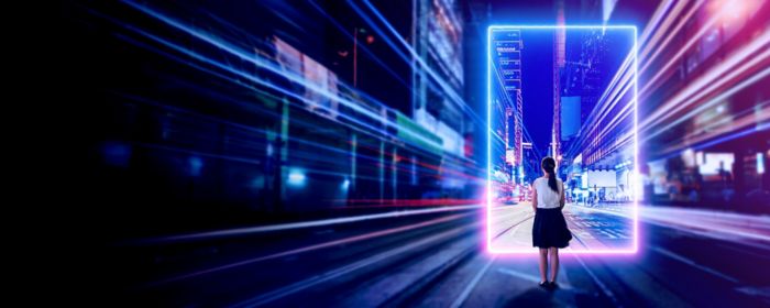 A young woman stands in front of a glowing portal in a city at night