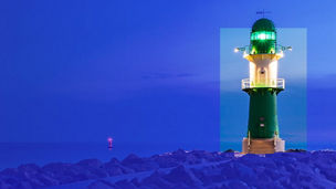 Imagen de un faro a la orilla del mar