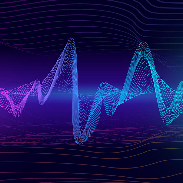 Abstract waveform made of thin multicolored lines in shades of pink, purple, and blue on a dark gradient background with curved horizontal lines