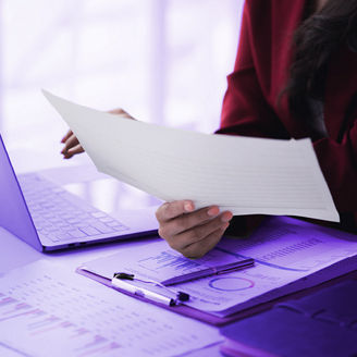 a person is reading a paper
