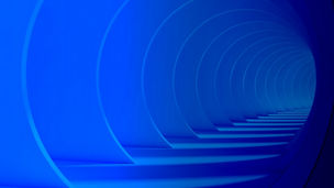 Outdoor shot of young woman using mobile phone outdoors in the city. Female business professional using smart phone in the city.