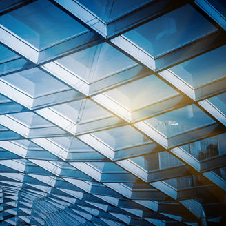 glass sunshade structure,blue toned image.
