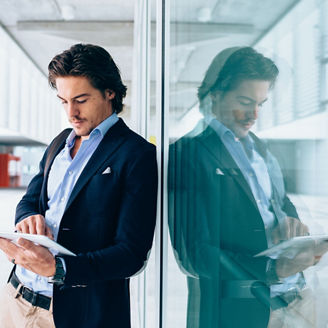 Businessman using digital tablet in office