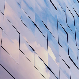 View of the clouds reflected in the glass office building. 3d rendering
