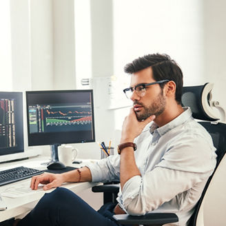 people working looking at papers